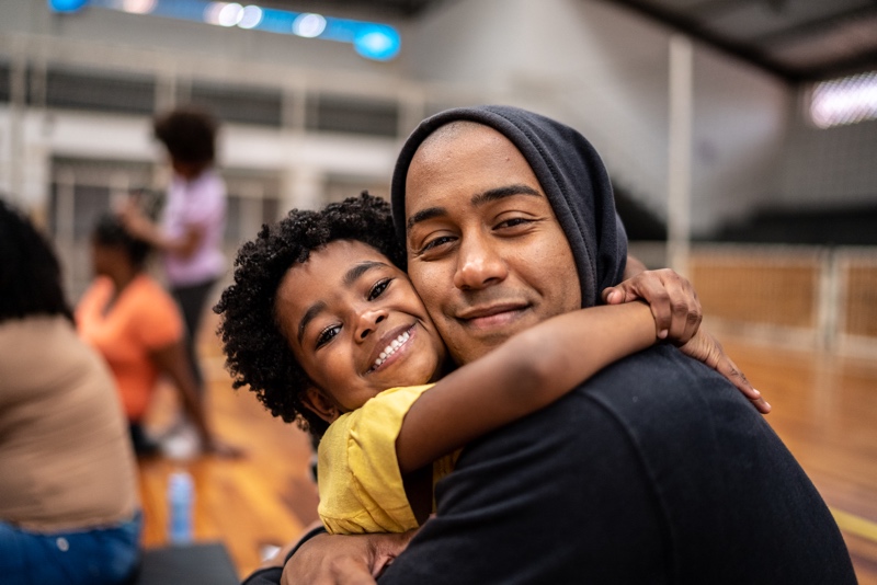 child hugging parent